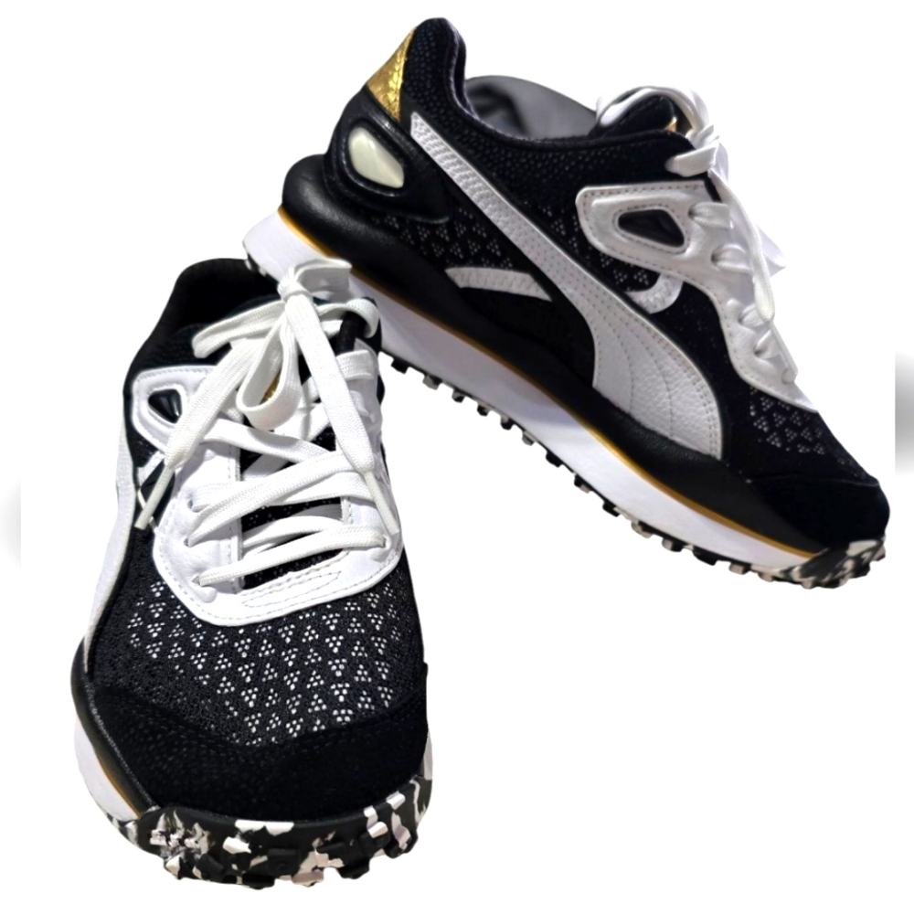 Rare Puma Black and White Sneakers with Gold Accents